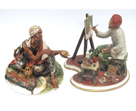 Capodimonte, Maggioni Figures of Artist Sitting by an Easel Painting 26cm tall (small faults) another of Aladdin. (2)