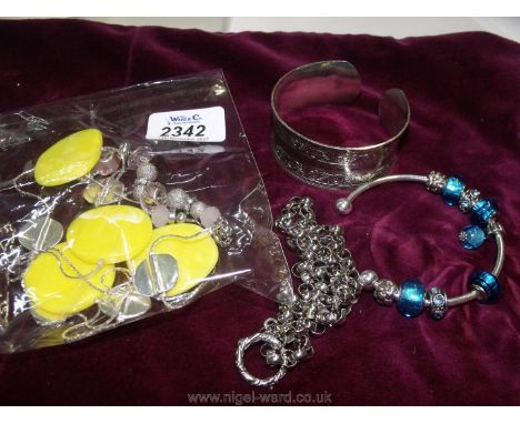 A white metal Bangle, necklace and bracelets