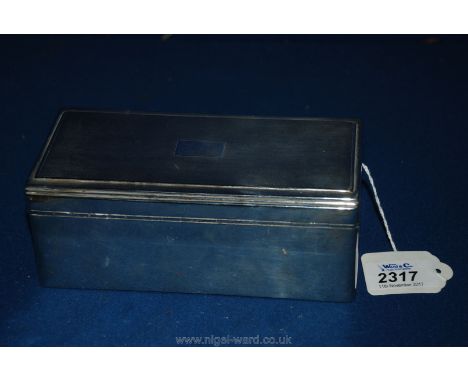 A Silver Table Cigarette Box with engine turned decoration to the lid, Birmingham 1948