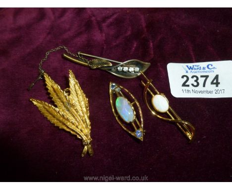 An Opal Brooch, Lily of the valley Brooch, feather Brooch and another