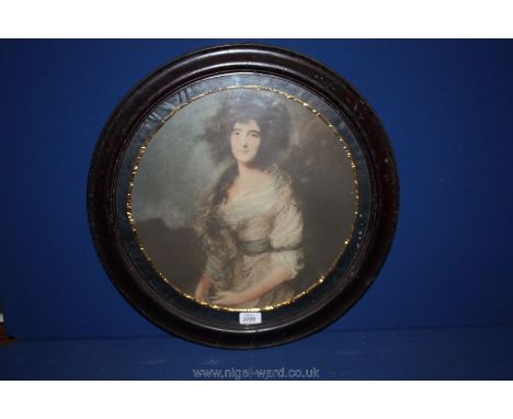 A circular wooden framed Print of a Lady