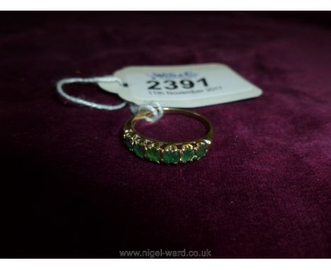 A 9ct Gold seven stone Emerald half Eternity Ring