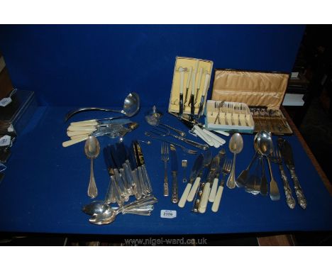 A quantity of plated and other cutlery including ladle, teaspoons, boxed Apostle spoons, pastry forks, butter knives, etc.