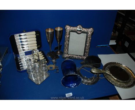 A quantity of silver plate including cased set of fish knives and forks, picture frame, goblets, large pin cushion in the for