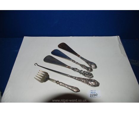 Three Silver Shoe Horns, a Silver handled Button Hook and Bread Fork