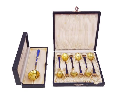 Set of six Danish silver-gilt blue enamel demitasse spoons with crown finials and together with an individually boxed example