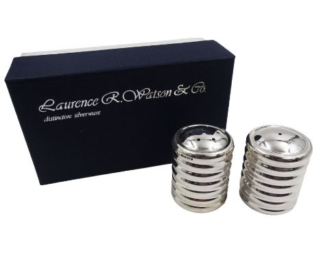 Pair of modern silver salt and pepper shakers, of cylindrical form, each with ridged band decoration, hallmarked Laurence R W