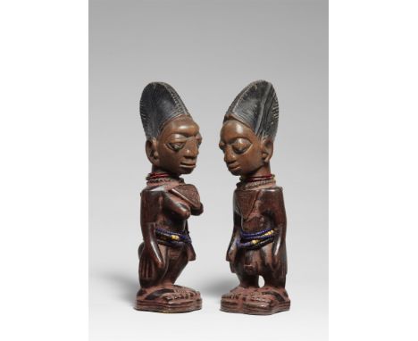 PAIR OF YORUBA TWIN FIGURES , ibejiCf. Stoll, M. and G., "Ibeji: Twin figures of the Yoruba", Munich, 1980, p.272, fig.16129 
