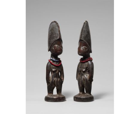 PAIR OF YORUBA TWIN FIGURES , ibejiCf. Stoll, M. and G., "Ibeji: Twin figures of the Yoruba", Munich, 1980, p.298, fig.19327.
