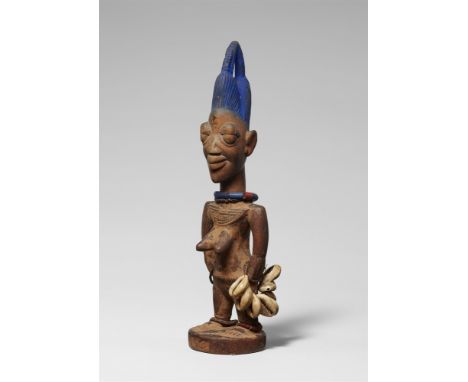 YORUBA TWIN FIGURE , ibeji, from the workshop of the “Master of Archaic Smile“Cf. Fagg, W. et al., "Yoruba Sculpture of West 