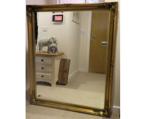 20th century large gilt and bevelled mirror. Approx. 130 x 106cm

Reasonable used condition 