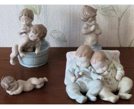 Four various Lladro glazed ceramic figures

reasonable used condition 