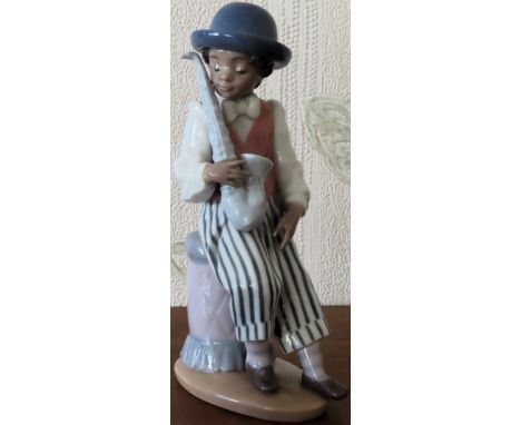 Lladro glazed ceramic figure - Jazz band Sax player. (No. 5833)

reasonable used condition 