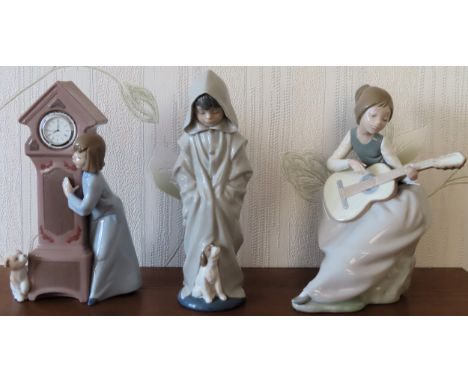 Three various large Nao glazed ceramic figures. Largest Approx. 28cms H

reasonable used condition 