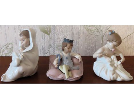 Three various Nao glazed ceramic figures. Tallest Approx. 25cms

reasonable used condition 