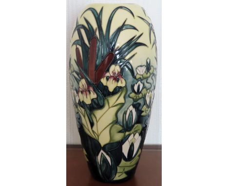 Large Moorcroft tubelined floral decorated ceramic vase depicting water Lillies. Approx. 36.5cm H

Reasonable used condition 