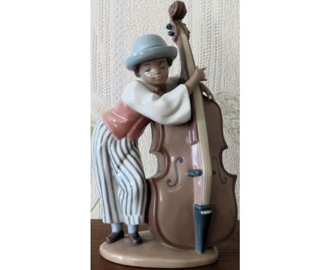 Lladro glazed ceramic figure - Jazz band Bass player (No. 5834). Approx. 22cms H reasonable used condition