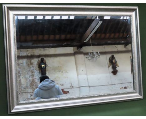 framed and bevelled wall mirror. Approx. 50 x 90

Reasonable used condition 