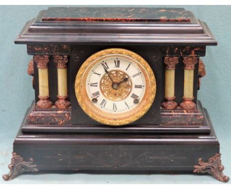 Seth Thomas Ebonised and gilded wooden mantle clock. App 31cm H

Used condition, not tested for working 