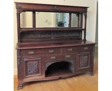 Late 19th century heavily carved mahogany mirror back sideboard. Approx. 173 x 184 x 61cms

used condition with scuffs scratc