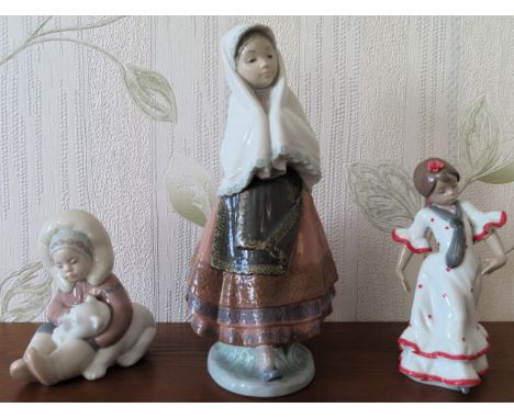 Three various Lladro glazed ceramic figures. Tallest Approx. 28cms

Tallest damaged 