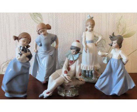 Five various Nao glazed ceramic figures. Tallest Approx. 25cms

all reasonable used condition 