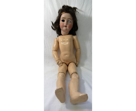 A K&amp;R Simon and Halbig large bisque headed doll, with brown hair and sleeping blue glass eyes, the back with K&amp;R fact