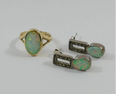 A pair of marcasite and Gilson opal drop earrings and a 9 carat gold single stone opal ring, possibly also synthetic, with cl