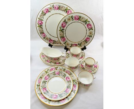 A quantity of Royal Worcester 'Royal Garden' pattern bone china tea and dinnerware, comprised of 12 dinner plates, 12 side pl