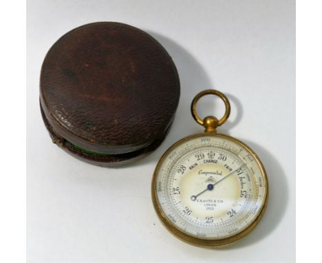 A pocket barometer by E R Watts and Son, London, in gilt metal case, 5cm diameter, with original morocco travelling case COND