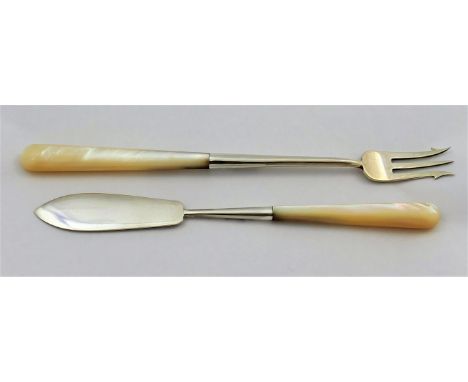 A large silver mother of pearl handled butter knife, 17.1cm long, and pickle fork, 118.9cm long, Sheffield 1931  CONDITION RE