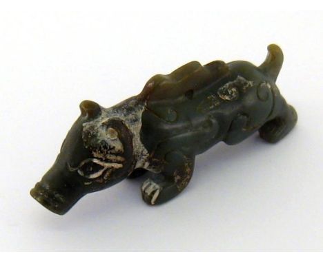 A jade carving of a mythical animal. 9.5cm. long. 