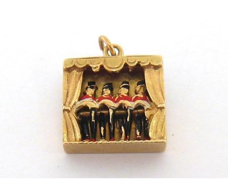 A 9 carat gold and enamel articulated charm, designed as a row of four can-can dancers, activated by a lever verso, fully hal