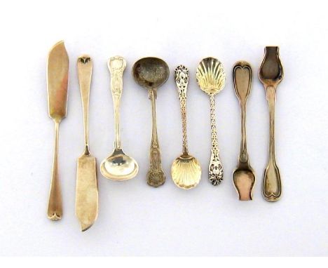 Two silver butter knives, London, 1935; a pair of Victorian salt spoons with lion mask terminals and shell bowls, London, 187