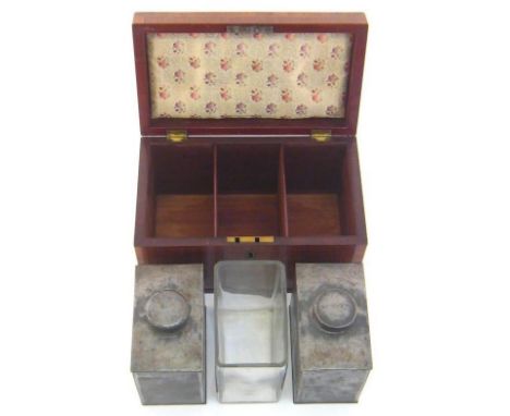 A George III mahogany tea caddy banded with Kingwood, interior with three compartments, containing a pair of tin caddies and 