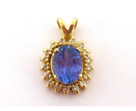 A tanzanite and diamond pendant, the central oval cut tanzanite approx. 1.65 carat, in a surround of small brilliants, mounte