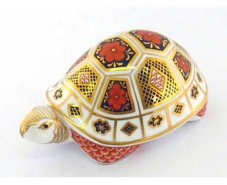 A Royal Crown Derby Imari Tortoise, gold button, red factory stamp, numbered L. 