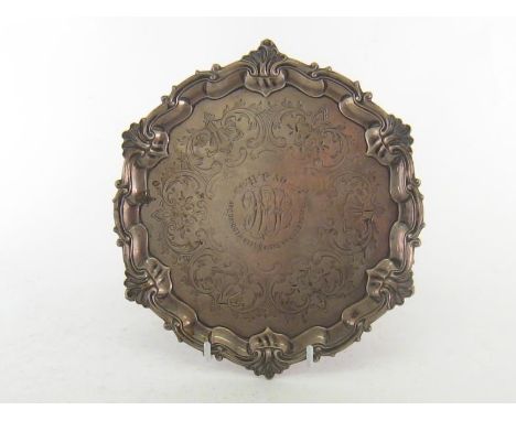 A Victorian silver salver by E. & J. Barnard, London, 1860, engraved with scrolls, flowers and stylised leaves enclosing init