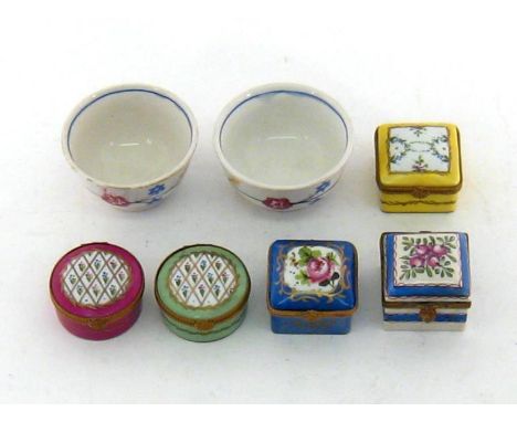 Four Limoges small ceramic boxes, two circular, one puce, one green, and two square, one yellow, one blue example, all hand p