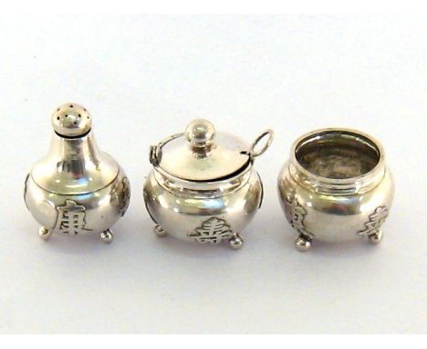 A small Chinese Export three-piece silver condiment set, mark of TH and Chinese character marks, circa 1930, mustard pot comp