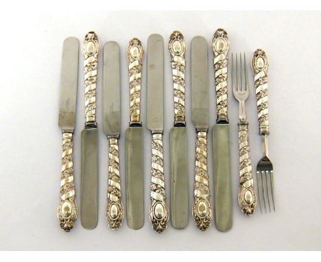 Eight Victorian fruit knives and two fruit forks en suite, the silver-plated handles wth diagonal ribbon and laurel bands,by 