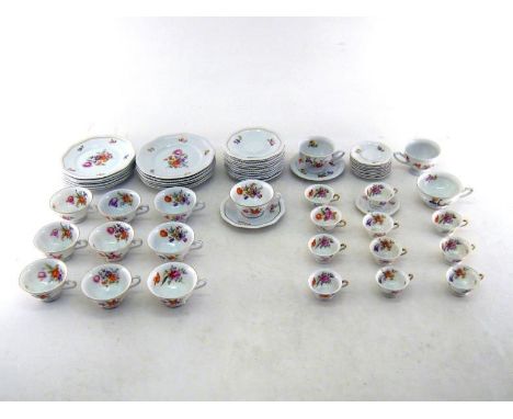 A Rosenthal tea set comprising twelve plates with thirteen cups and saucers. 