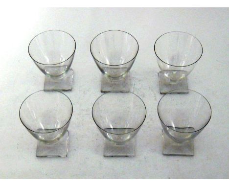 Lalique. A set of six Lalique red wine glasses with square bases and louvre shape bowls, each engraved “Lalique crystal”, in 