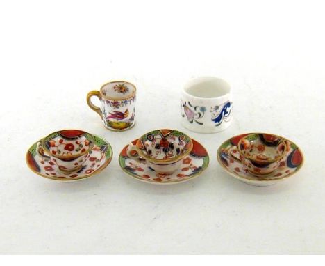 Three 19th. century miniature cups and  saucers in the Crown Derby palette, unmarked apart from one decorator’s mark, one sau