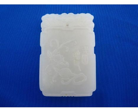A Chinese white jade plaque, carving in bas relief on a piece of very white jade, one side with a scene of lotus and covered 