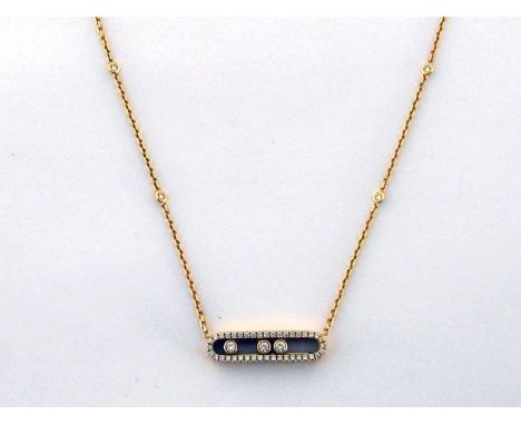 MESSIKA, 'Baby Move', an 18 carat gold and diamond necklace, the central open work oval pendant with three central articulate