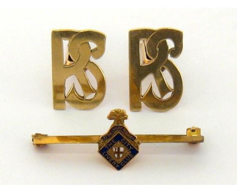 A pair of yellow metal (tests 14 carat gold) cuff links, the links cut as open work monogram 'RS', swivel bar fittings, 10gms