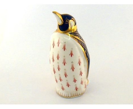 A Royal Crown Derby Emperor Penguin, gold button, red factory mark, numbered XLIX. 