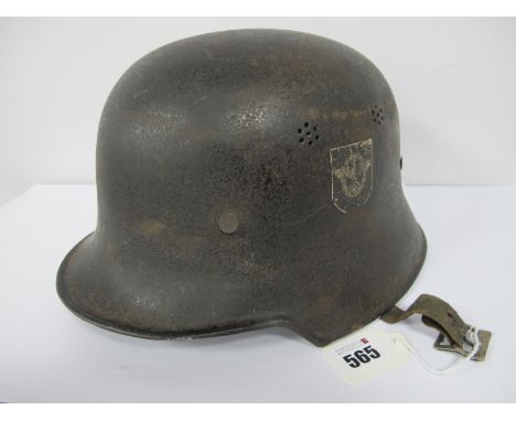 A WWII Era German Light Weight M34 Police Issue Double Decal Helmet, with liner and remnants of chin strap makers mark and se