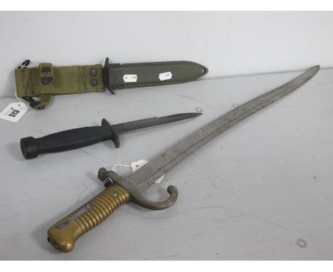  A Modern Military Fighting Knife, with scabbard and cotton webbing hanger, along with a French Model 1866 Chassepot yataghan